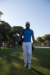 Image showing golf player walking