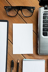 Image showing close up of blank paper and office supplies