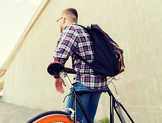 Image showing hipster man with fixed gear bike and backpack