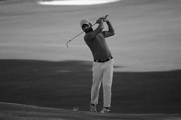 Image showing golf player hitting long shot