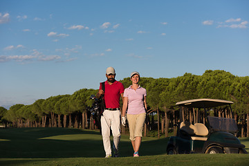 Image showing portrait of golfers couple on golf course