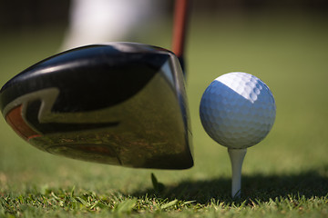 Image showing golf club and ball in grass