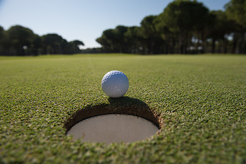 Image showing golf ball in the hole