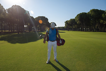 Image showing golf player walking