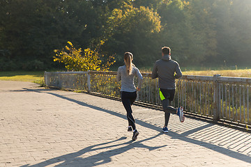 Image showing couple running or jogging outdoors