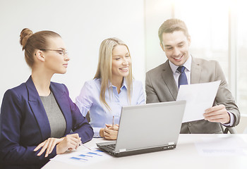 Image showing business team with laptop having discussion