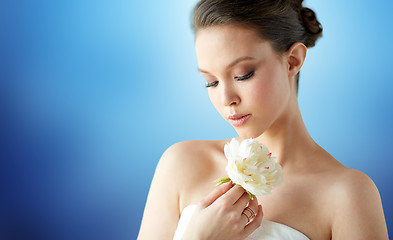 Image showing beautiful asian woman with flower and jewelry