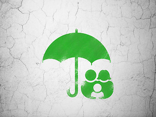 Image showing Security concept: Family And Umbrella on wall background