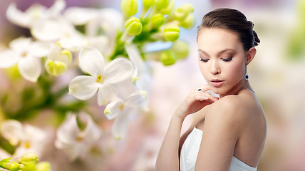 Image showing beautiful woman with earring, ring and pendant