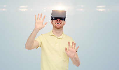 Image showing happy man in virtual reality headset or 3d glasses