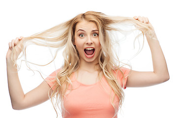 Image showing woman holding strand of her hair