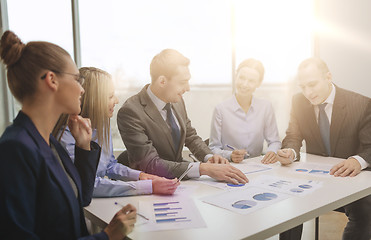 Image showing smiling business team at meeting