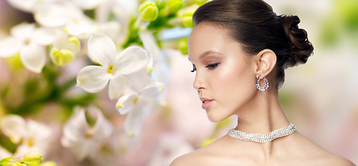 Image showing close up of beautiful woman face with earring