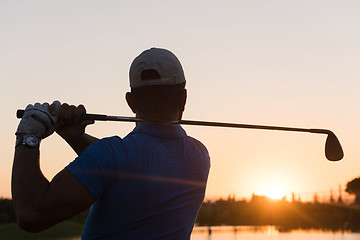 Image showing golfer hitting long shot