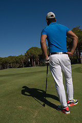 Image showing golf player portrait from back