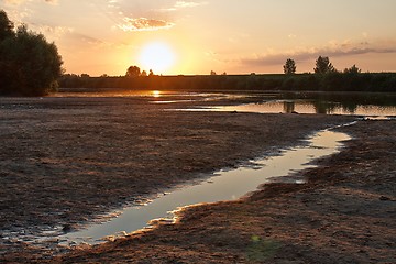 Image showing Sunset over a river