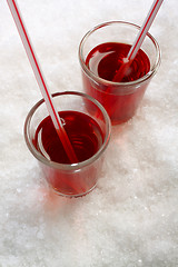 Image showing Two red drinks from above