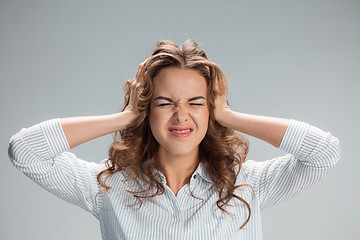 Image showing The young woman\'s portrait with pain emotions