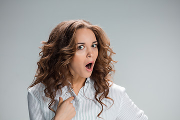 Image showing Portrait of young woman with shocked facial expression