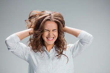 Image showing The young woman\'s portrait with pain emotions