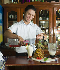 Image showing editorial bartender mixing drink in restaurant Corn Island Nicar