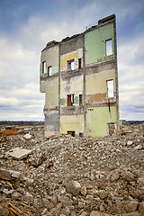 Image showing Pieces of Metal and Stone are Crumbling from Demolished Building