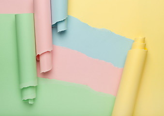 Image showing Abstract torn colored paper background
