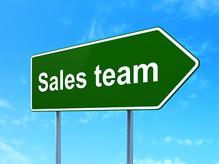 Image showing Advertising concept: Sales Team on road sign background