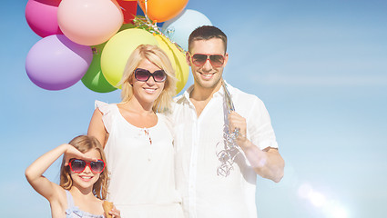 Image showing family with colorful balloons