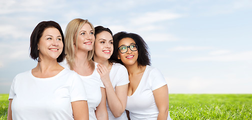 Image showing group of happy different women in white t-shirts