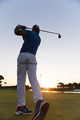 Image showing golfer hitting long shot