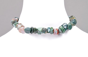 Image showing Splintered moss agate chain on bust