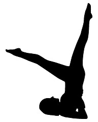 Image showing Silhouette of woman doing exercises