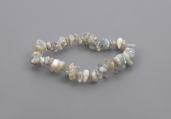 Image showing Splintered labradorite chain on gray background