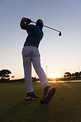 Image showing golfer hitting long shot