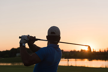 Image showing golfer hitting long shot