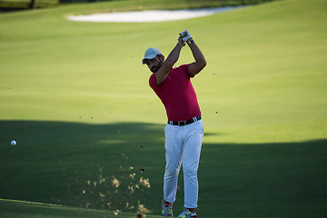 Image showing golf player hitting long shot