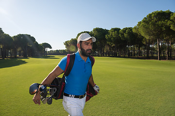 Image showing golf player walking