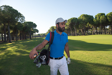 Image showing golf player walking