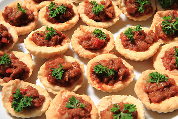 Image showing raw meat with salted cookies