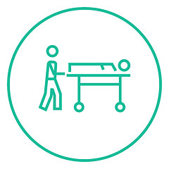 Image showing Man pushing stretchers line icon.