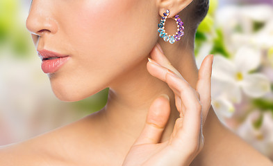 Image showing close up of beautiful woman face with earring