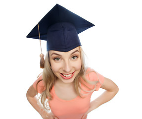 Image showing smiling young student woman in mortarboard