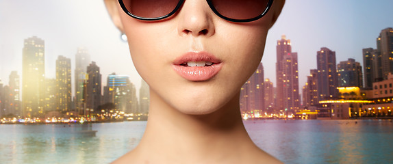 Image showing close up of beautiful woman in black sunglasses
