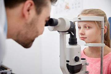 Image showing optician with tonometer and patient at eye clinic