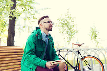 Image showing happy young hipster man with fixed gear bike