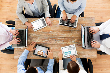 Image showing business team with laptop and tablet pc computers
