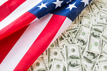 Image showing close up of american flag and dollar cash money