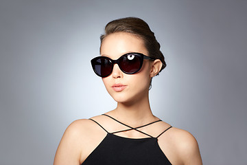 Image showing beautiful young woman in elegant black sunglasses