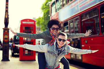 Image showing happy teenage couple having fun in london city